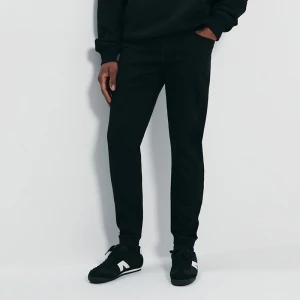 Czarne joggery jeansowe z przetarciami House