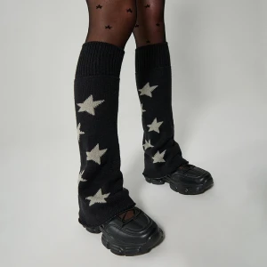 Czarne ocieplacze na kostki w gwiazdki House