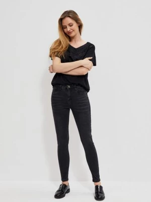 Czarne spodnie damskie jeansowe skinny z przetarciami Moodo