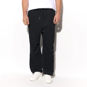 Czarne spodnie dresowe baggy fit z zaszewkami House