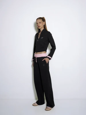 Czarne spodnie dresowe lh team Top Secret