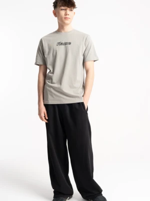 Czarne spodnie dresowe OVERSIZE z modnymi cięciami Reporter