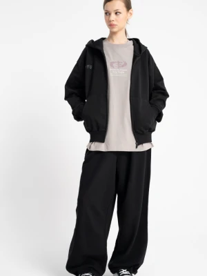 Czarne spodnie dresowe typu PARACHUTE z zaszewkami na kolanach Reporter