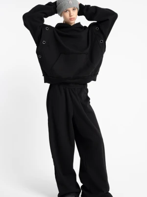 Czarne spodnie dresowe z metalowymi oczkami z szerokimi nogawkami Reporter