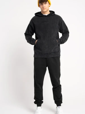 Czarne spodnie dresowe z minimalistycznym nadrukiem Reporter