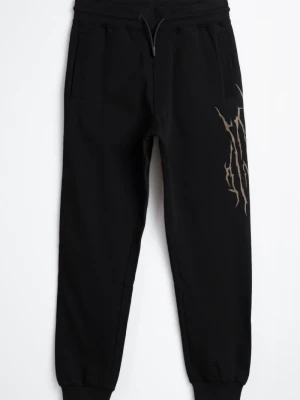 Czarne spodnie dresowe z nadrukiem na nogawce Reporter