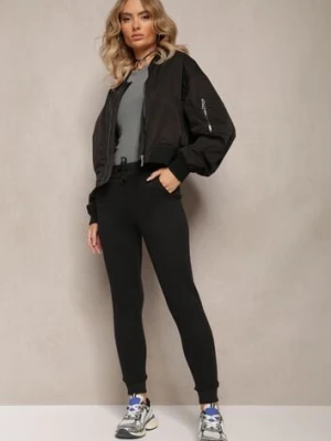 Czarne Spodnie Dresowe z Regularnym Stanem i Polarem Minnah glo-story