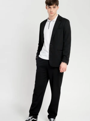 Czarne spodnie garniturowe typu CHINOS Reporter