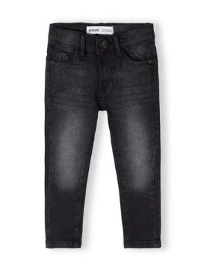 Czarne spodnie jeansowe chłopięce typu skinny Minoti