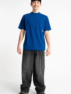 Czarne spodnie jeansowe SKATER z modnymi cięciami Reporter