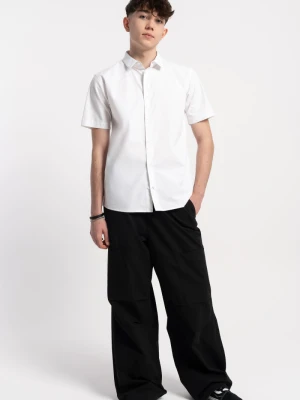 Czarne spodnie materiałowe PARACHUTE z modnymi zakładkami na nogawkach Reporter