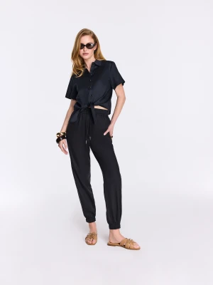 Czarne spodnie o kroju joggers z wysokim stanem TARANKO