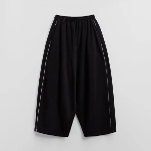 Czarne spodnie super baggy z lampasami House