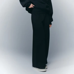 Czarne spodnie wide leg z odwijanym pasem House