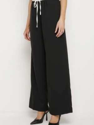 Czarne Spodnie z Szerokimi Nogawkami z Gumką w Pasie i Ściągaczem Fuma retro & icone