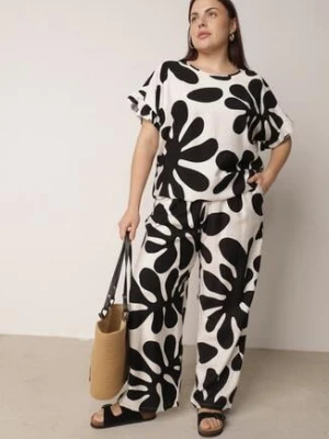 Czarny Komplet z Wiskozy Bluzka z Falbankami i Szerokie Spodnie w Liście Thalla ambitionfly