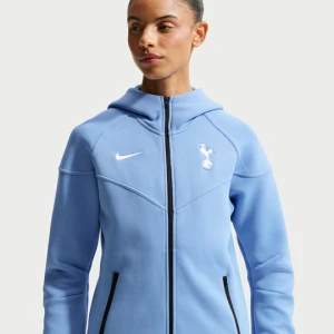 Damska bluza do piłki nożnej z kapturem i zamkiem na całej długości Nike Tottenham Hotspur Tech Fleece Windrunner - Niebieski