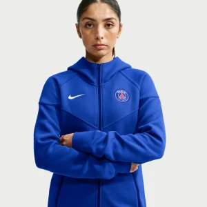 Damska bluza piłkarska z kapturem i zamkiem na całej długości Nike Paris Saint-Germain Tech Fleece Windrunner - Niebieski
