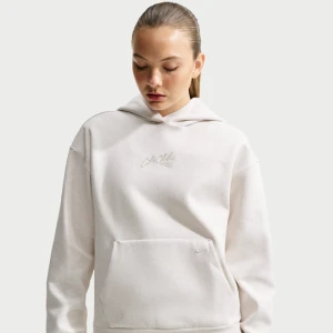 Damska bluza z kapturem do koszykówki Dri-FIT Caitlin Standard Issue - Brązowy Nike
