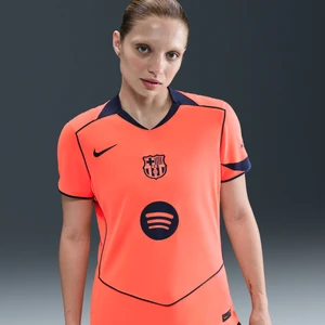Damska koszulka piłkarska Nike Dri-FIT Total 90 FC Barcelona 2025/26 Stadium (wersja trzecia) – replika - Pomarańczowy