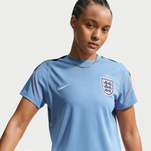 Damska koszulka piłkarska z krótkim rękawem Nike Dri-FIT Anglia Strike - Niebieski