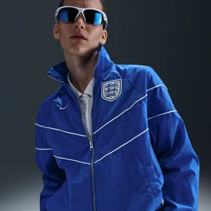 Damska kurtka piłkarska z tkaniny z ochroną przed promieniowaniem UV Nike Anglia Windrunner - Niebieski