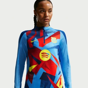 Damska przedmeczowa treningowa koszulka piłkarska Nike Dri-FIT FC Barcelona Strike (wersja czwarta) - Niebieski