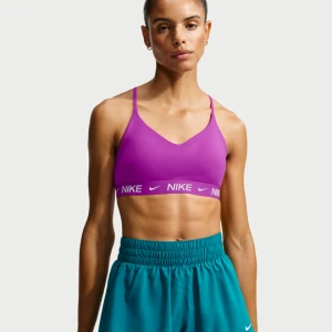Damski regulowany stanik sportowy z wkładkami Nike Indy Light Support - Fiolet
