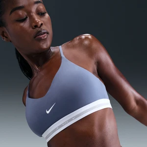Damski stanik sportowy z regulacją i wkładkami zapewniający lekkie wsparcie Nike Indy - Niebieski