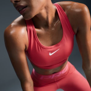 Damski stanik sportowy z wkładkami Nike Swoosh Medium Support - Różowy