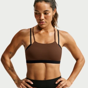 Damski stanik sportowy z wkładkami zapewniający lekkie wsparcie Nike Zenvy - Brązowy