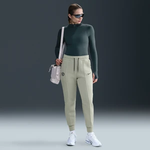 Damskie joggery piłkarskie z dzianiny ze średnim stanem Chelsea F.C. Tech - Zieleń Nike