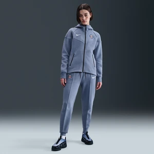 Damskie joggery piłkarskie z dzianiny ze średnim stanem Nike Paris Saint-Germain Tech - Niebieski