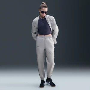 Damskie joggery piłkarskie z tkaniny ze średnim stanem Nike FC Barcelona Essential Repel - Szary