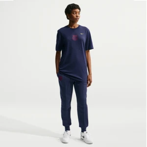 Damskie joggery piłkarskie ze średnim stanem Nike FC Barcelona Tech Fleece - Niebieski