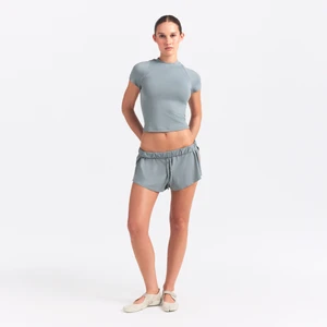 Zdjęcie produktu Damskie spodenki mini NikeSKIMS Airy - Czerń