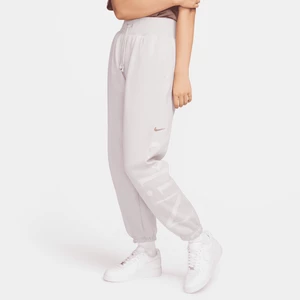 Damskie spodnie dresowe o kroju oversize z logo Nike Sportswear Phoenix Fleece - Fiolet