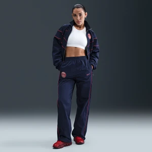 Damskie spodnie piłkarskie z tkaniny z wysokim stanem i luźnymi nogawkami Nike Paris Saint-Germain Windrunner - Niebieski
