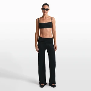 Damskie spodnie z szerokimi nogawkami NikeSKIMS Stretch Knit - Czerń