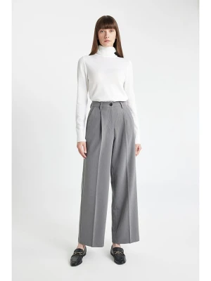 DeFacto Spodnie w kolorze szarym rozmiar: 34