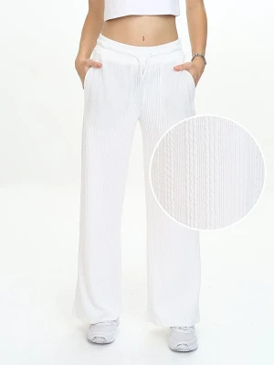 Denokids Spodnie dresowe w kolorze białym rozmiar: 134