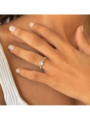 DIA DIAMONDS Pozłacany pierścionek z diamentami i topazem rozmiar: 52 złoty