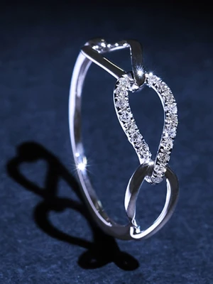 DIAMANTA Złoty pierścionek "Triple boucles" z diamentami rozmiar: 58