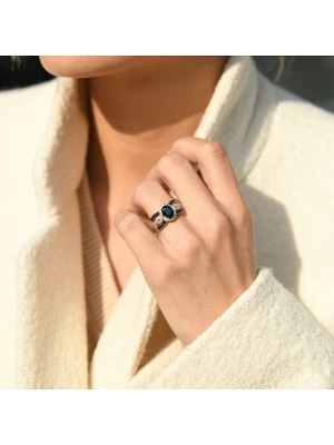 DIAMOND & CO Złoty pierścionek "Dakan" z diamentami i szafirami rozmiar: 60