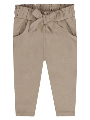 Dirkje Legginsy w kolorze beżowym rozmiar: 86