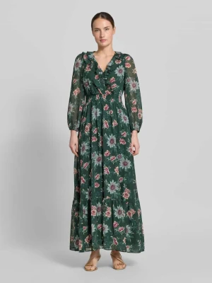 długa sukienka z dół obszyty falbaną i dekolt w serek Zero