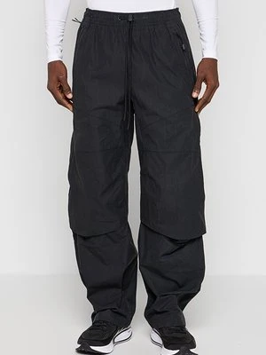 Długie spodnie trekkingowe Nike Sportswear