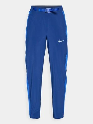 Długie spodnie trekkingowe Nike Sportswear