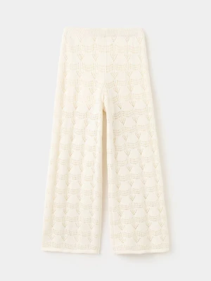 Długie spodnie z ażurowej dzianiny złamana biel - Dzieci - lata - MANGO KIDS