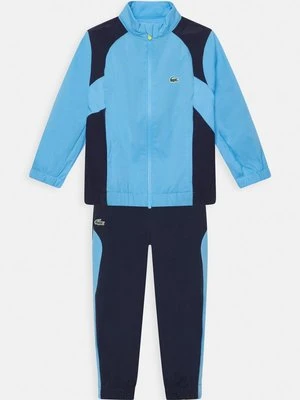 Dres Lacoste